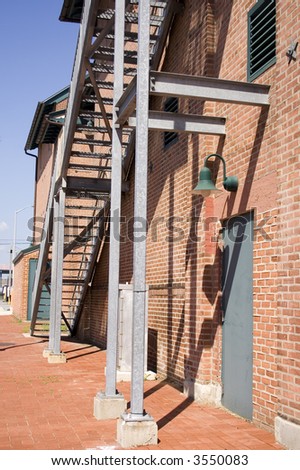 Stage Door Entrance to a Theatre Under an Exterior Staircase