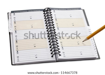Planner notebook with pointed pencil