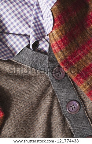 Brown clothes with checkered collar and scarf on the side