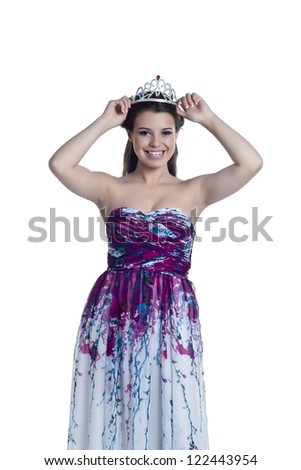 Close-up image of cheerful prom queen isolated on a white surface
