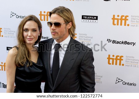 TORONTO, ON/CANADA - SEPTEMBER 9, 2011:  Hollywood power couple Brangelina graces the red carpet for the screening of Brad`s latest flick Moneyball on September 9, 2011 in Toronto