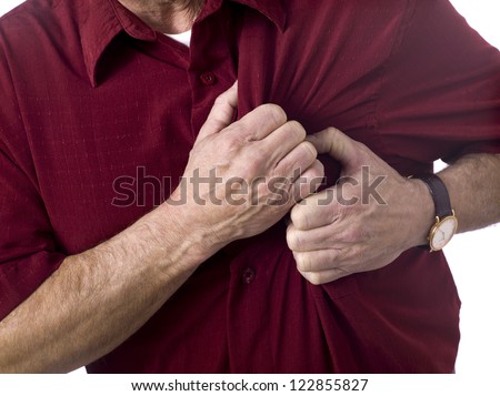 Close up image of old man having chess pain against white background