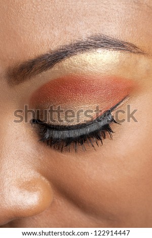 Cropped close-up shot of a female with eyes closed, samara Powder
