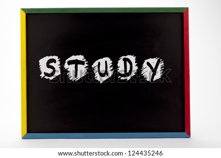 Study written on small students slate board and displayed on white background.