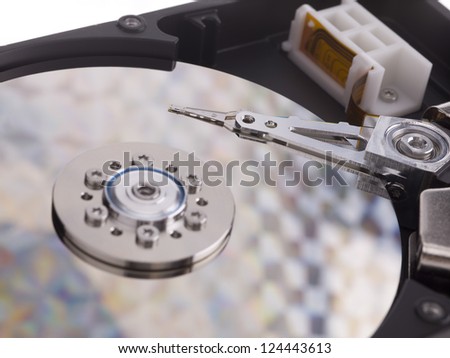 A hard drive with a shiny pattern across its surface