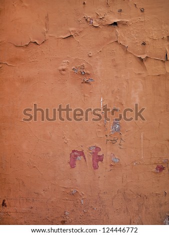 Cracked Orange Paint on Italian Wall
