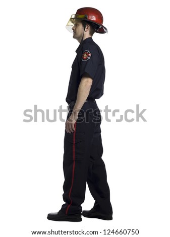 Side view of a fireman over the white surface