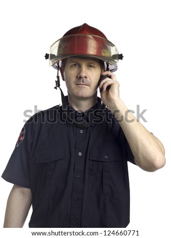 Close-up image of a mature fireman talking on CB phone