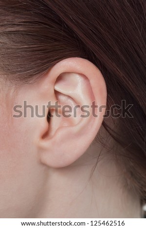 Closed up shot of a woman\'s ear