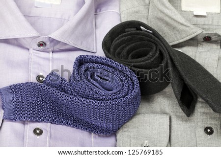 Two folded corporate clothes in a macro image