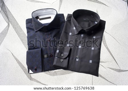 An image of two dark color shirt isolated