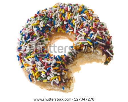Close-up image of delicious donut with a small bite