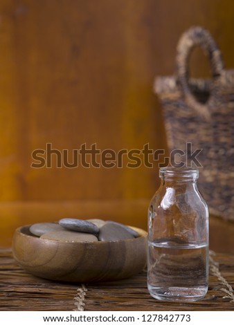 Close up image of spa essential oil and stone