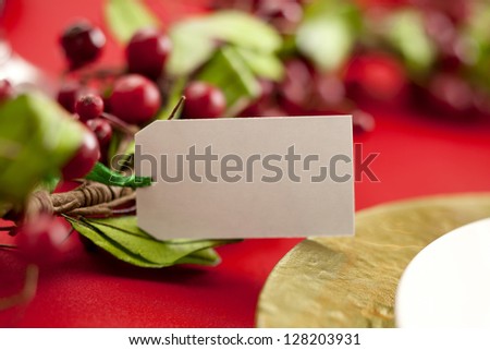 Close-up shot of a blank label with red berries