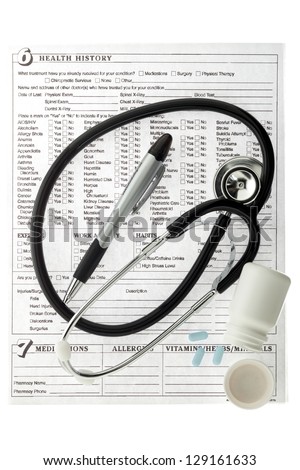 Medical report with stethoscope and medicines isolated on white background.