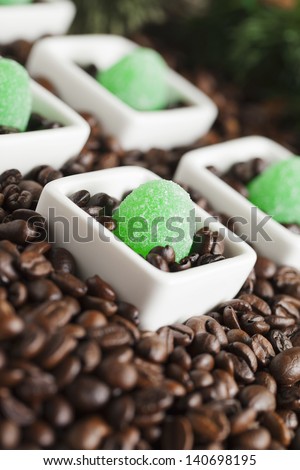 Coffee beans on a dish with jelly candies