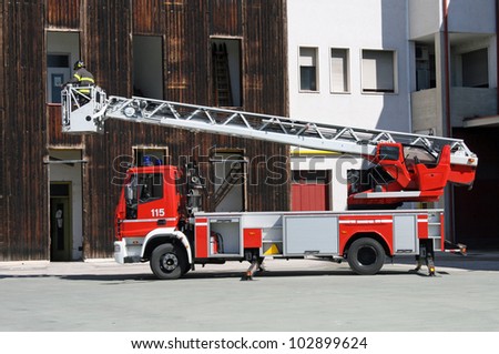 Italian fire trucks ladder truck during a rescue mission