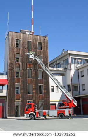 Italian fire trucks ladder truck during a rescue mission