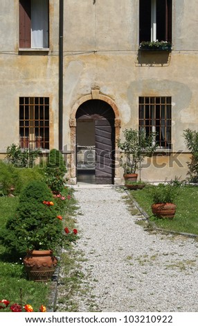 access door to the convent of the friars of an Abbey in Italy