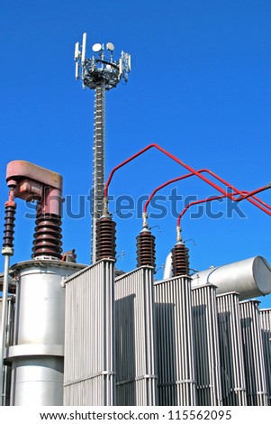 electricity transformer and an antenna for the transmission of signals