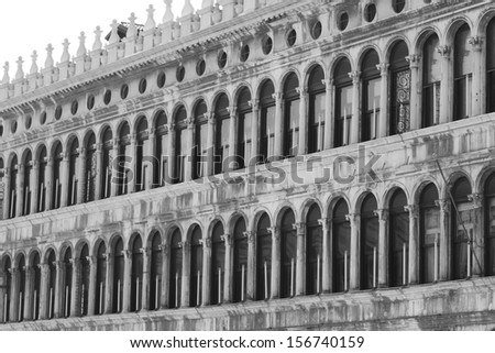 ancient balcony in Venetian style with arched windows in saint mark square in venice