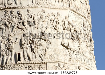 beautiful high-reliefs with  Romans warriors  sculpted in Trajan\'s column in Rome