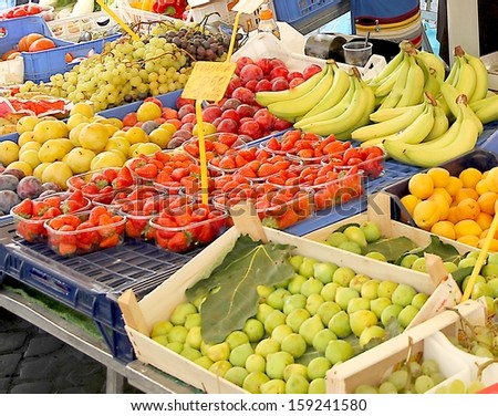 fruit and vegetable stall for sale at vegetable market in summer