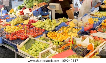 fruit and vegetable stall for sale at vegetable market in summer