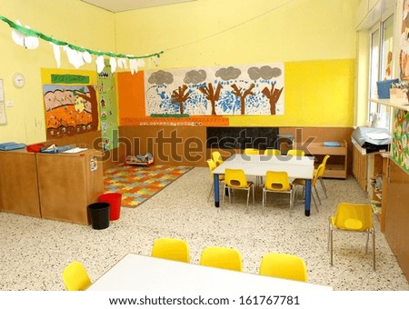 classroom in a kindergarten with little chairs for the children classroom in a kindergarten with little chairs for the children
