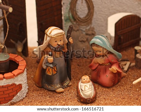 Jesus Joseph with the beard and the stick and Mary in a manger on Christmas and a well 2