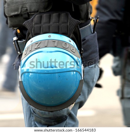 Italian police helmet blue ready to be worn during a demonstration in the big Italian city