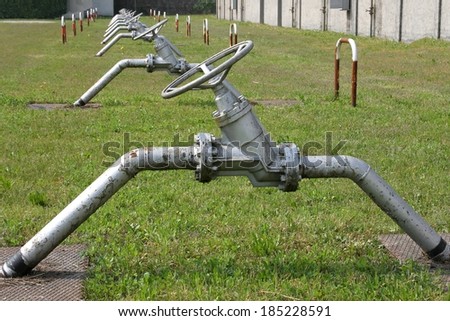 huge valves control the flow of gases and flammable liquids in pipes