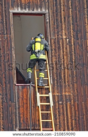 brave firefighter with oxygen cylinder during a fire drill at Firehouse 4