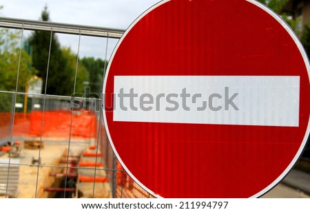 prohibition sign in roadworks for the laying of underground cables in the town