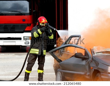 fearless fireman extinguishes the fire after car accident 2