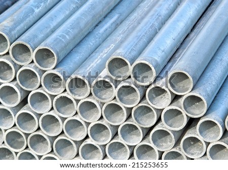 pile of iron pipes for the transport of electrical cables and optical fibres
