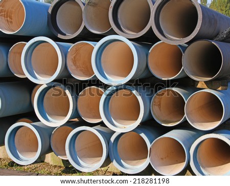 huge blue tubes for waterworks and sewer system of the city