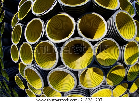 wallpapers of yellow corrugated pipes in a roadworks for laying optical fiber for telecommunications
