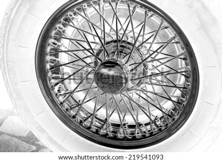 brilliant steel circle of a vintage car
