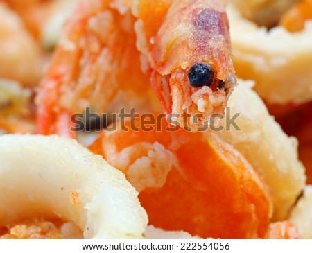 large fried shrimp with macro lens and other fried fish