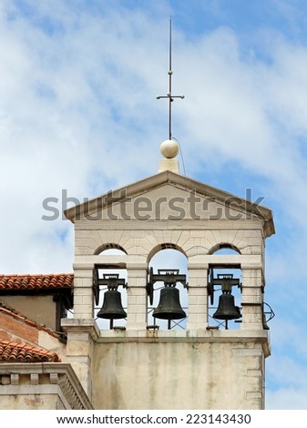 bell tower with three bell in a ancient church in venice