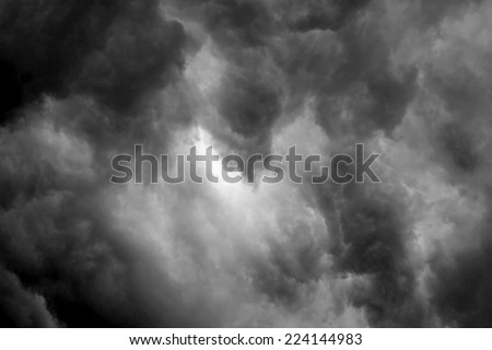 light of God shining through black clouds