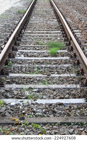 long train rails of an abandoned track