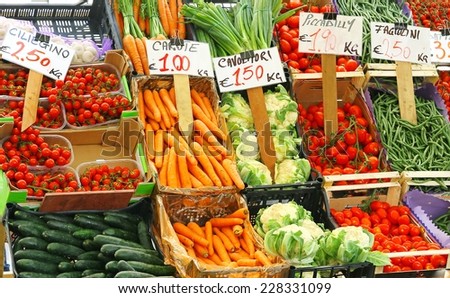 boxes of fresh fruits and vegetables for sale in the Italian market stall outdoor