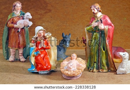 Nativity scene with Mary and Joseph and the baby Jesus near Shepherd