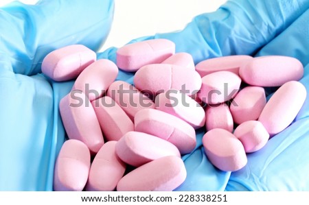 many pink pads for the vitamin cure doctor blue glove