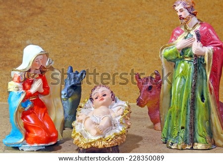 Holy Family in the tradition of Christmas with doneky and ox