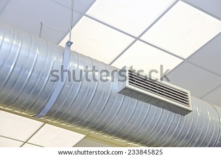 big steel tube of air conditioning and heating in an industrial setting