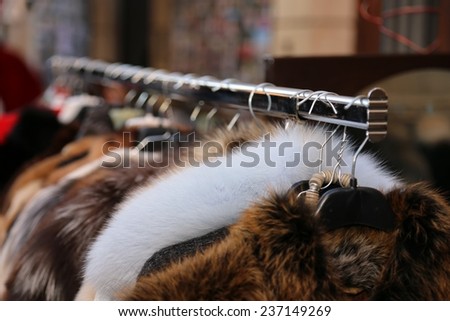 furs and used clothes for sale at flea market