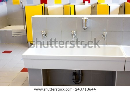 small bathrooms of a school for children with low ceramic sinks